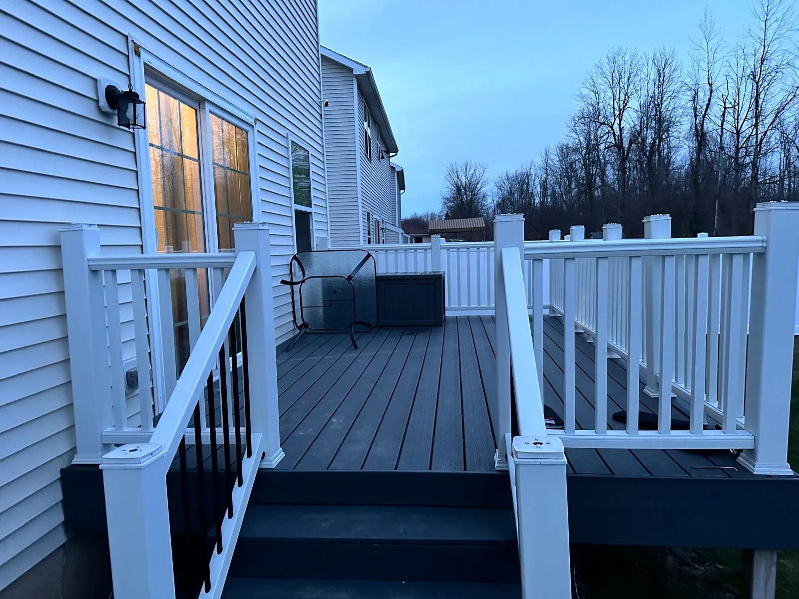 Gray composite deck with white vinyl railing — Buffalo NY