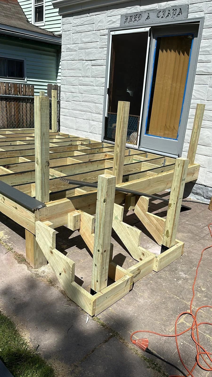 Deck ledger board and joist framing — Buffalo NY