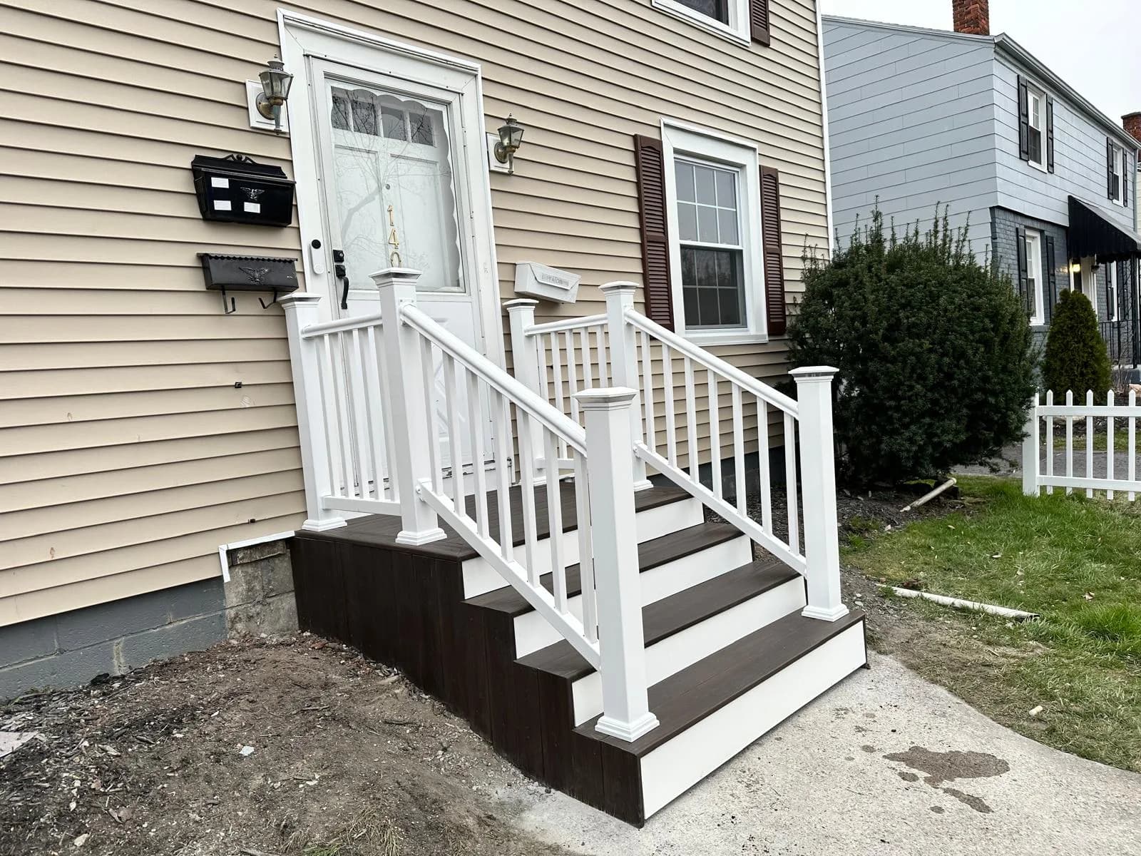 White vinyl front entry steps — Buffalo NY